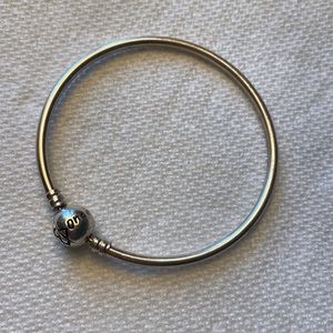 Pandora “one in a million” heart charm bracelet. Round clasp.